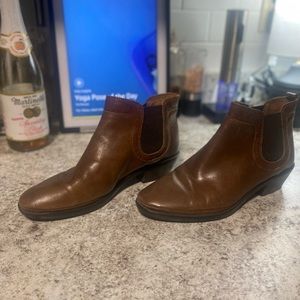 Brown leather boots.